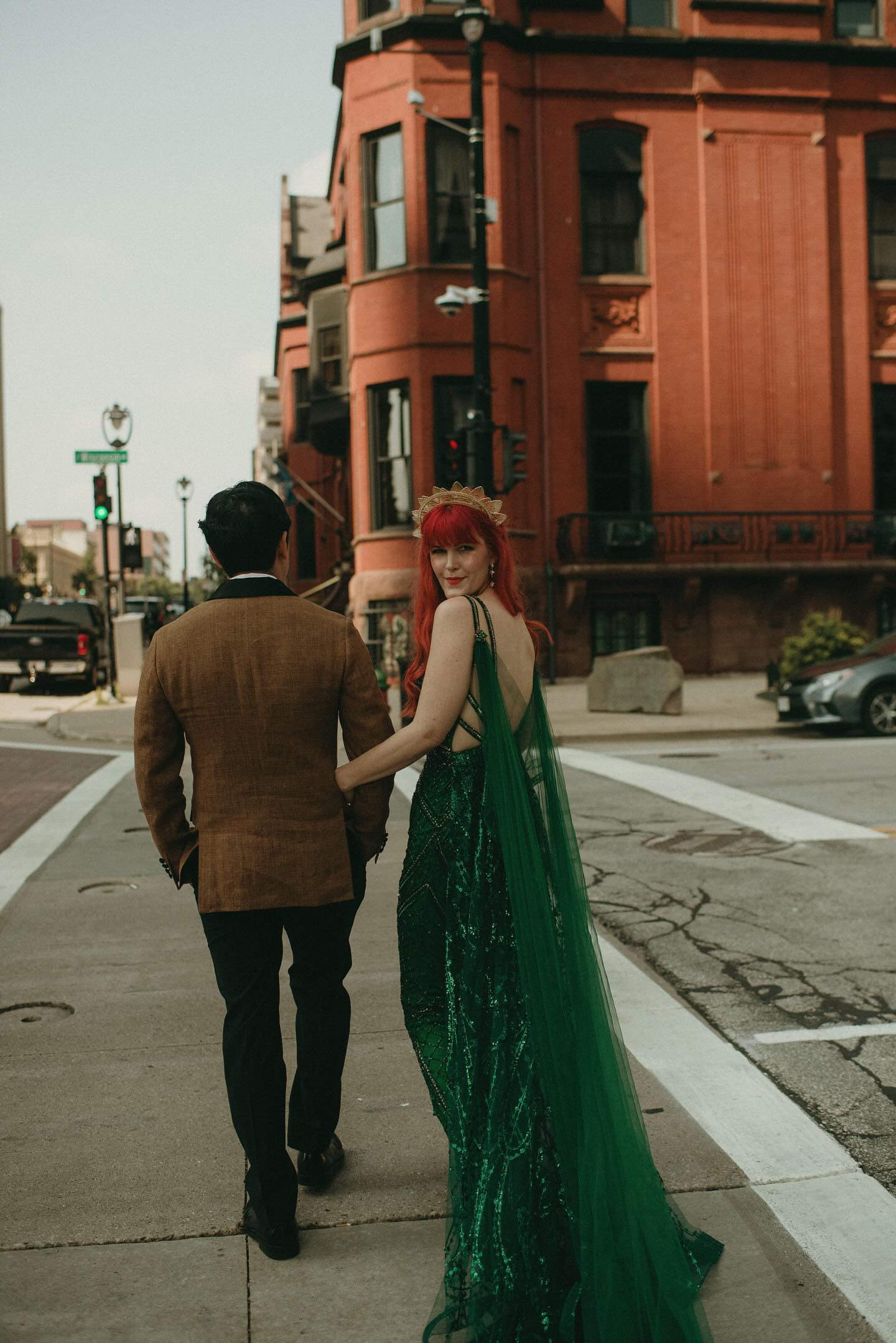 post wedding walk with bride in emerald green diy bridal cape veil and sequin sparkly alternative bridal gown