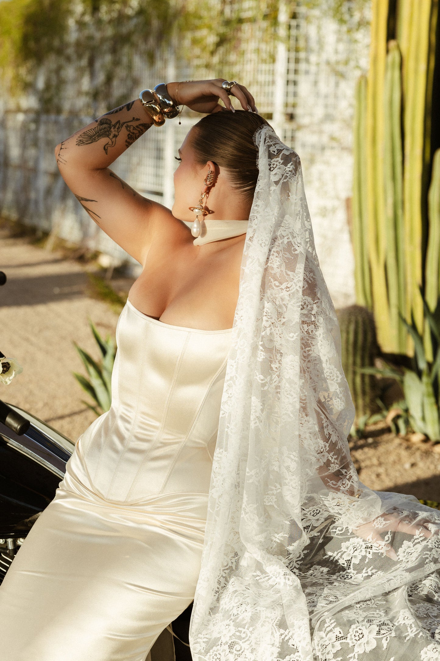 chantilly lace ankle length veil and matching bridal scarf on bride with tattoos