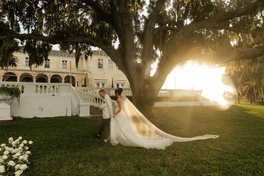 extra long cascade bridal veil for private estate formal wedding at sunset