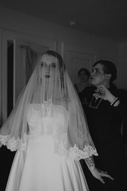 bride in DIY lace bridal veil with blusher and eyelash lace