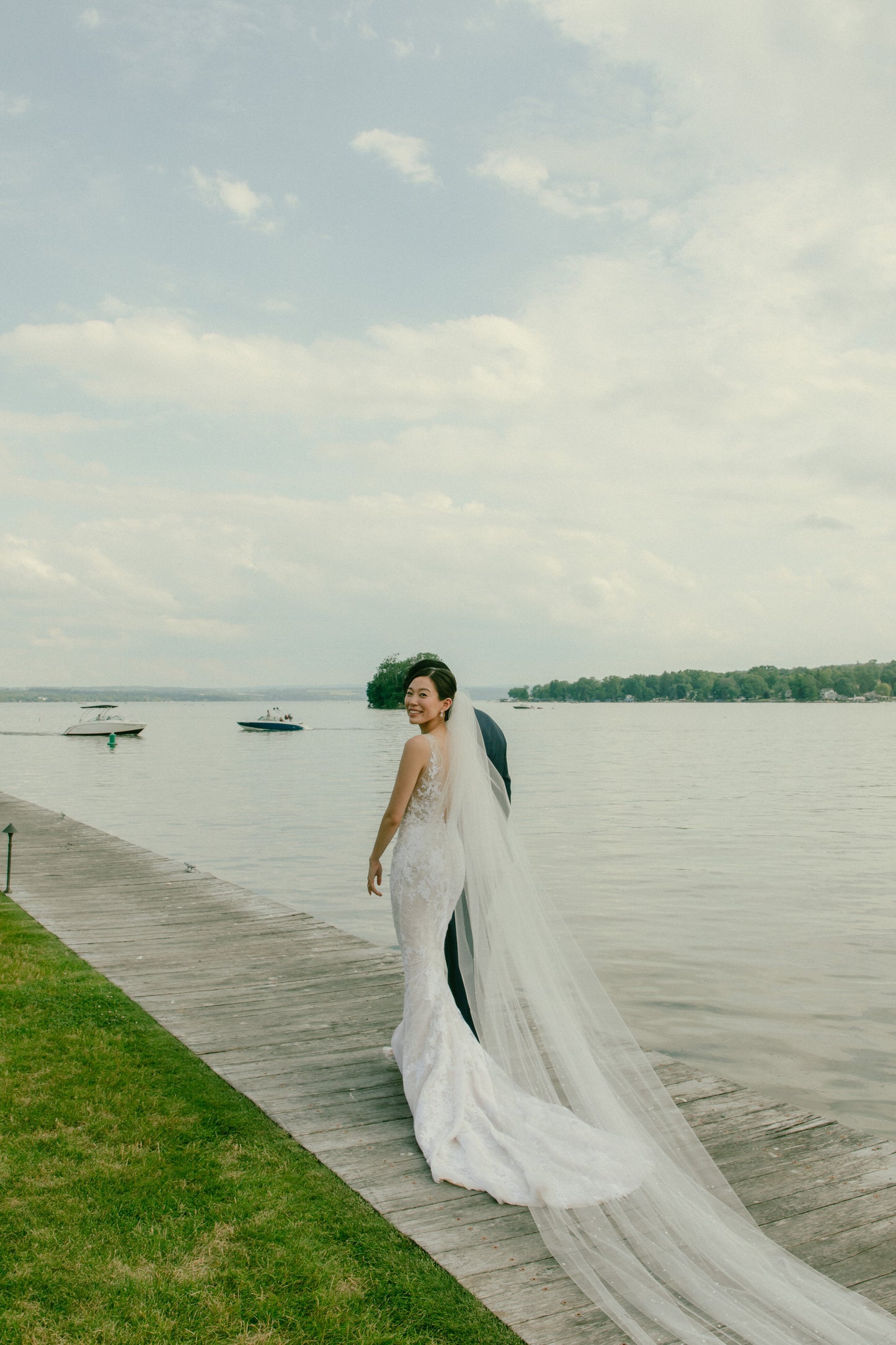 royal length extra long and wide beaded dew drop wedding veil in bride's updo bun