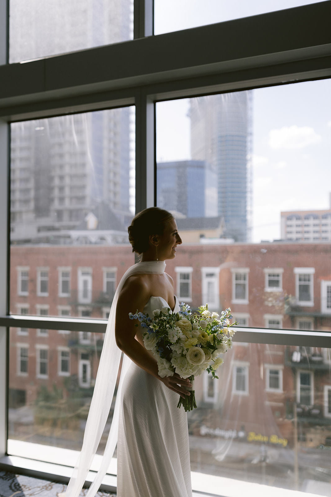 long and narrow wedding scarf in off white on bride in chignon updo