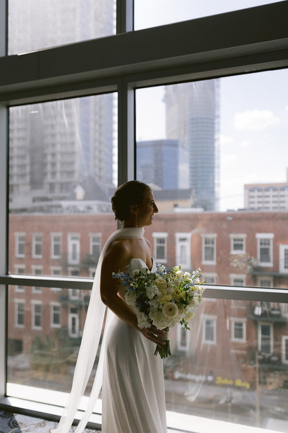 long and narrow wedding scarf in off white on bride in chignon updo