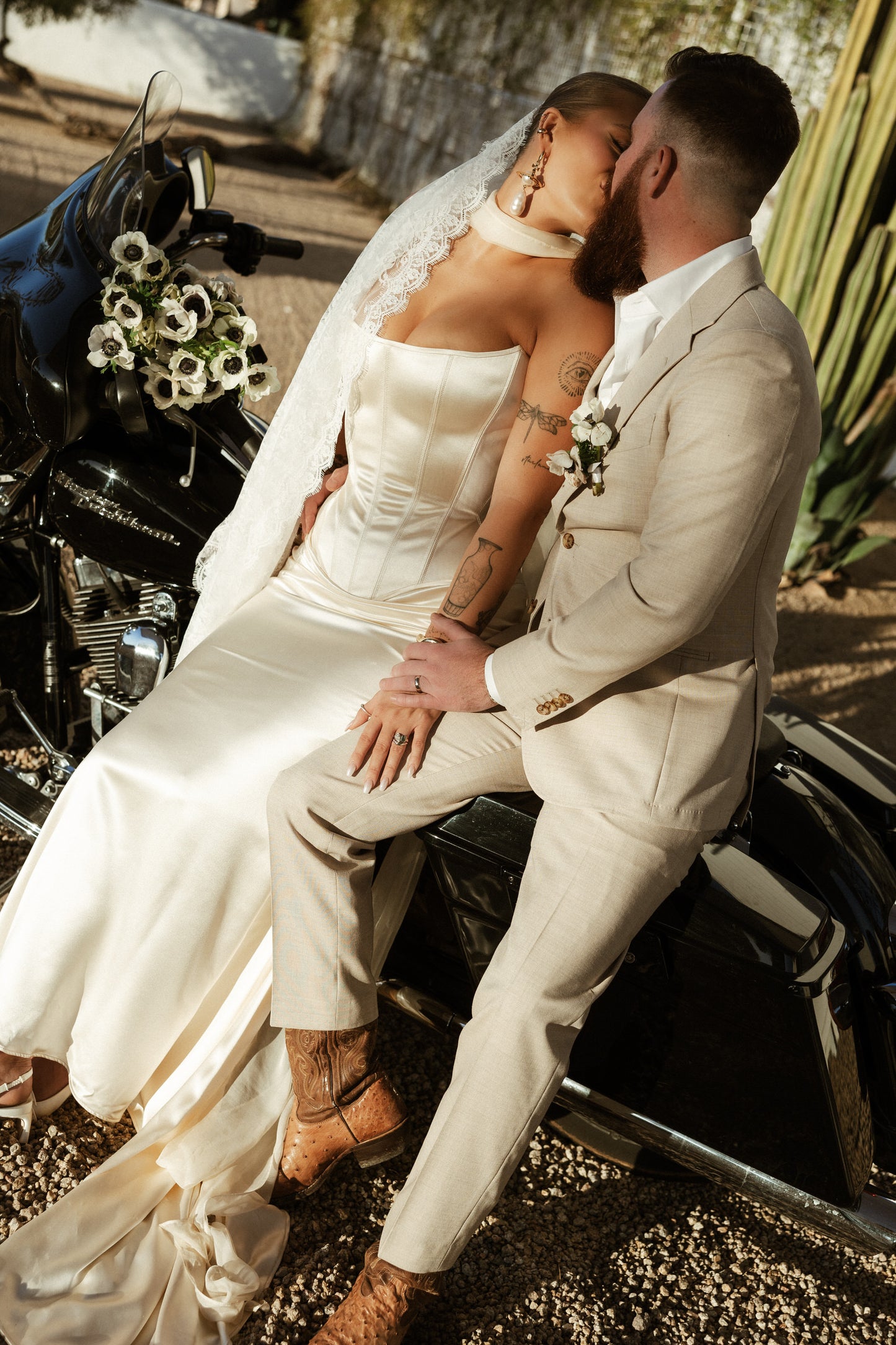 skinny scarf and matching lace mantilla wedding veil on bride in oversized pearl drop earrings