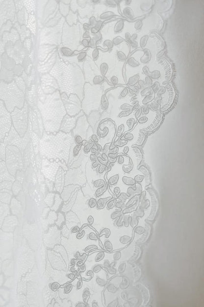 French alencon lace trim on mantilla wedding veil in white