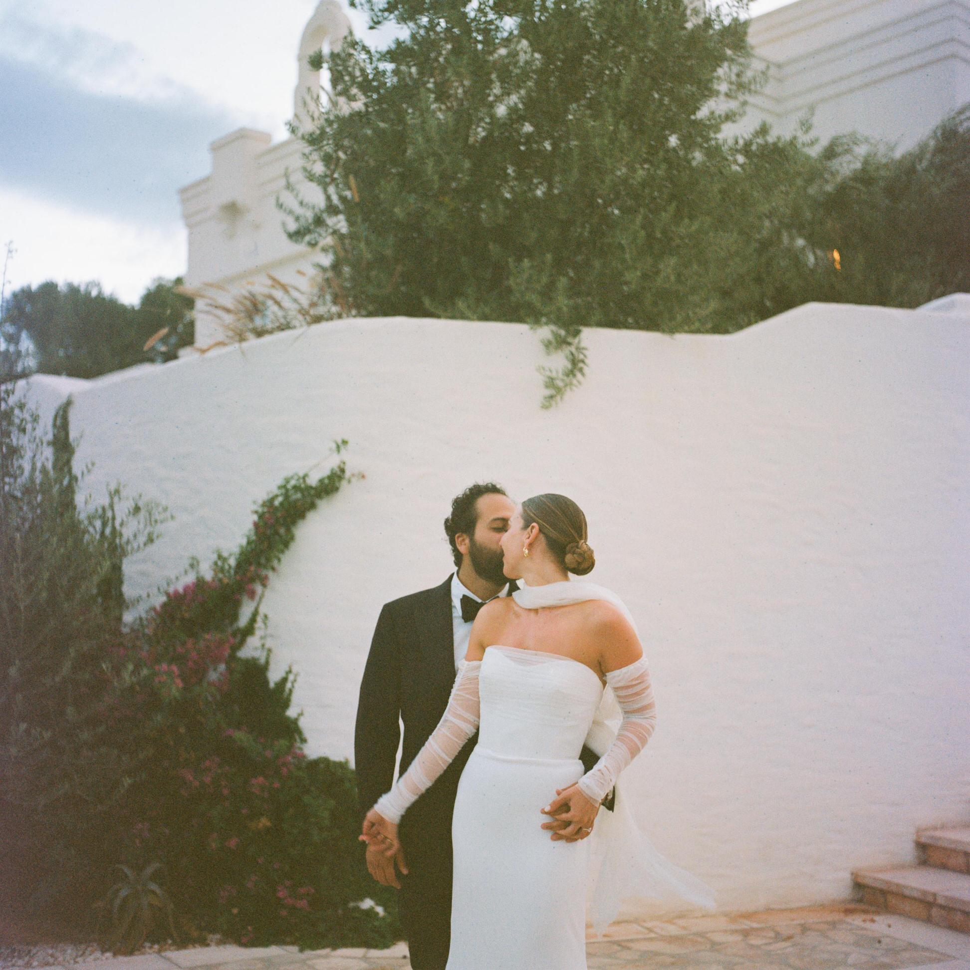 Load video: bride wears tulle bridal neck scarf for her wedding in los alamos california