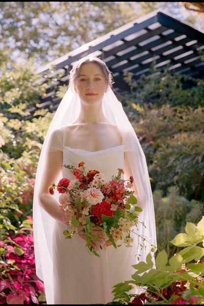 silk soft mid length veil in garden setting