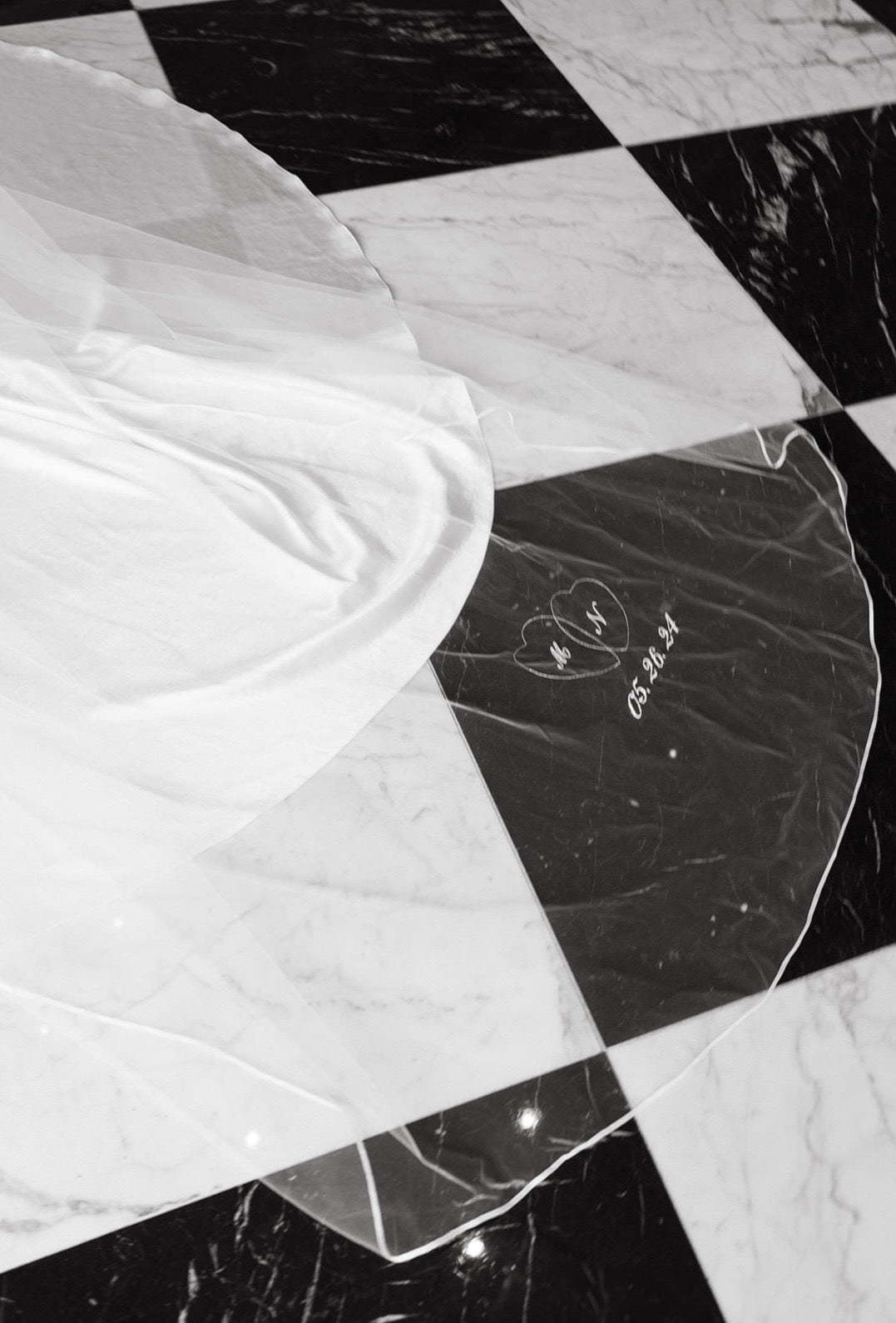 dainty heart embroidery with script cursive initials and wedding date on long bridal veil