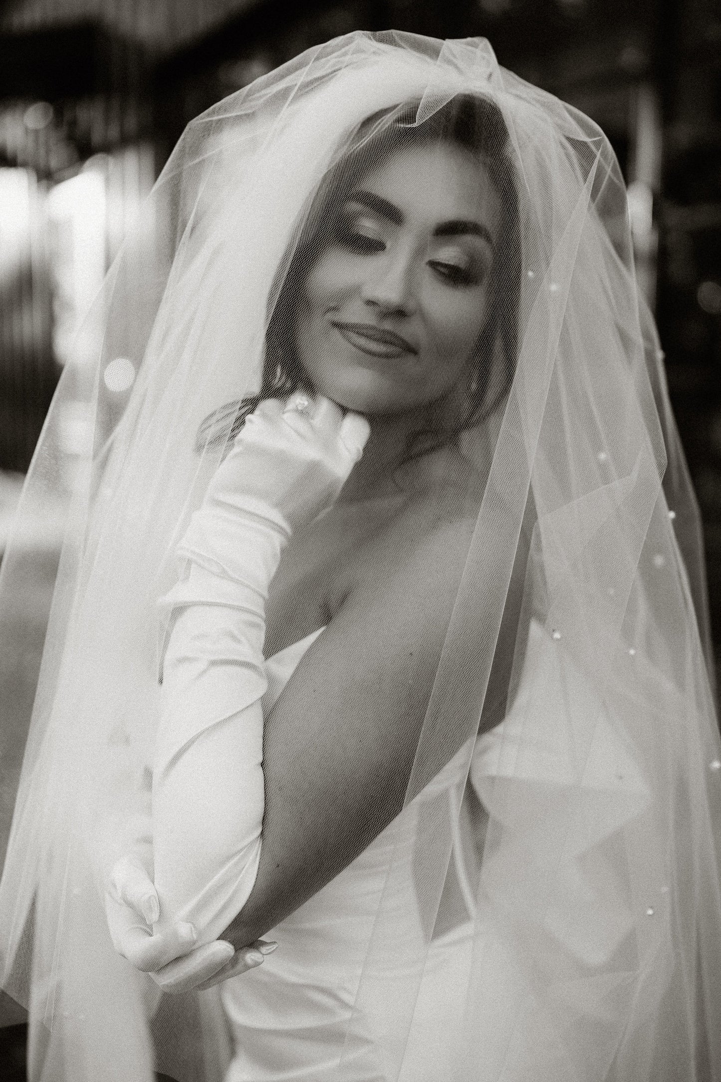 two tier puffy bridal veil with scattered pearls and matching satin gloves